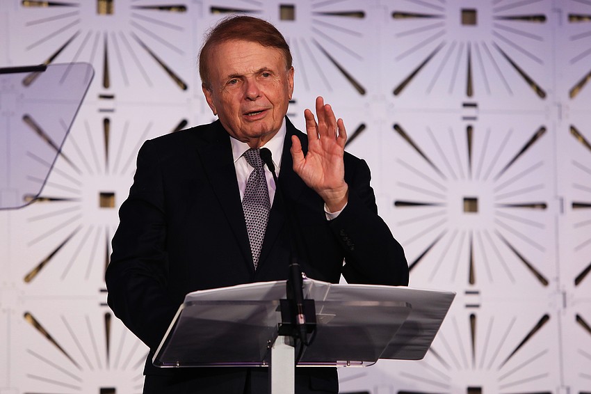 Larry Thompson leads off the event.