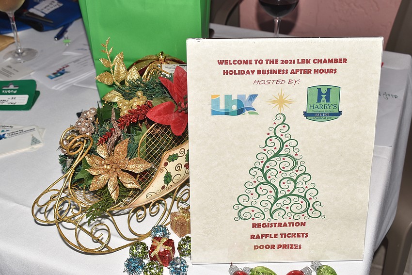 Members dropped raffle tickets into the bucket in the hopes of taking home door prizes.