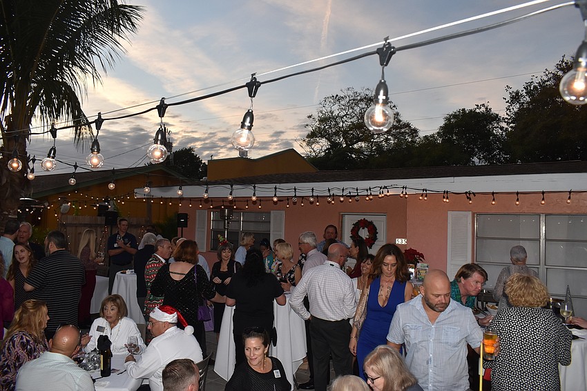 Members spent the party out on the patio at Harry's.