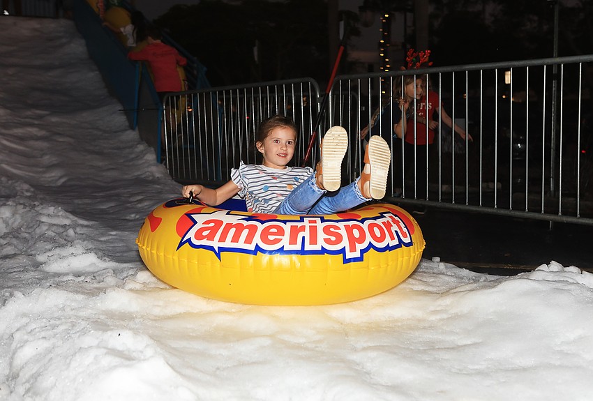 Harper Williamson slides down the ice.