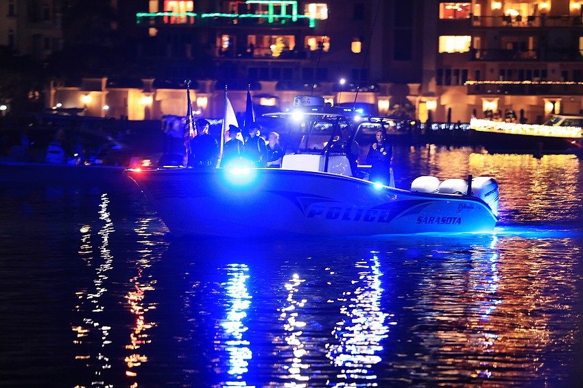 Boats cruise through the Bayfront Park area.