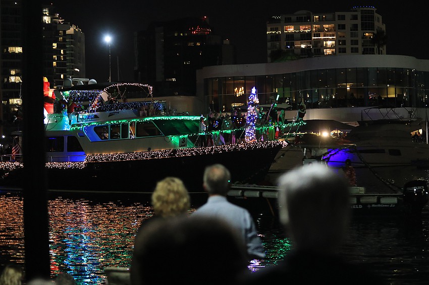 Boats cruise through the Bayfront Park area.