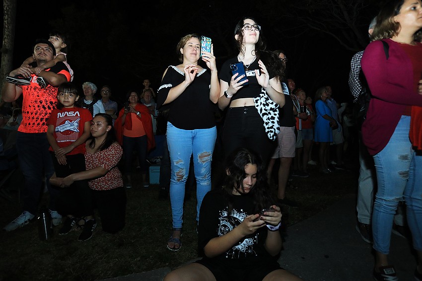 Suyin, Claudia and Elizabeth Balbuena watch the boats go by.