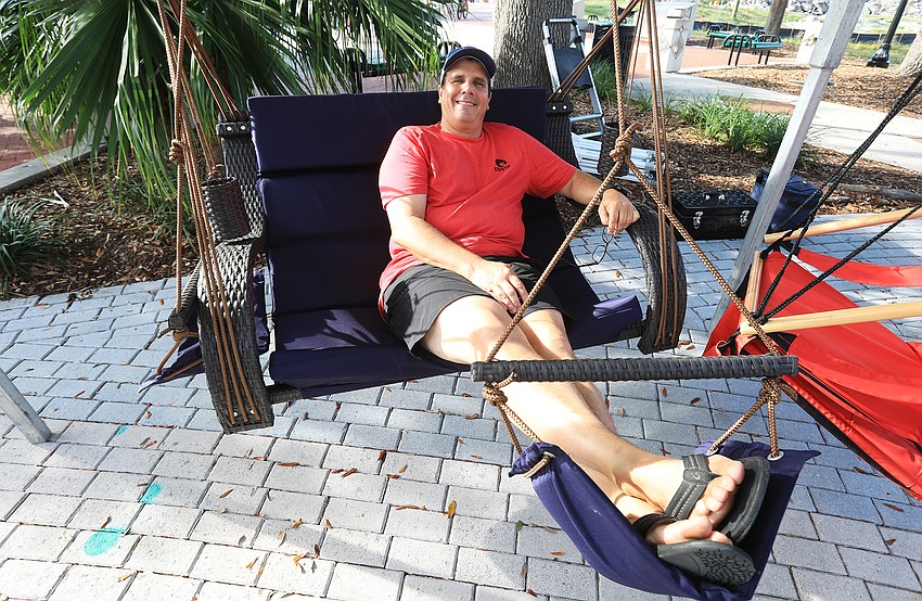 Jason Becker from South Carolina with upscale hanging chairs.
