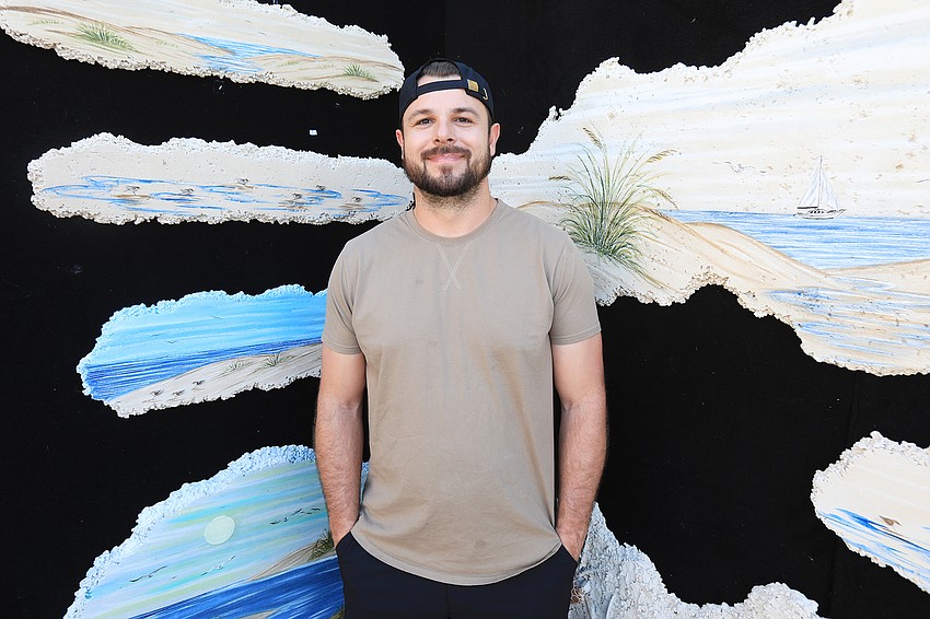 Mike DeMichele from Sarasota makes sand sculptures using artistic cement.