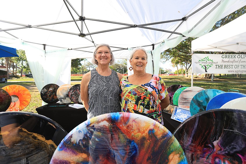 Ann Thierren and Stephanie Stapleton from Auburndale display their Lazy Susans.