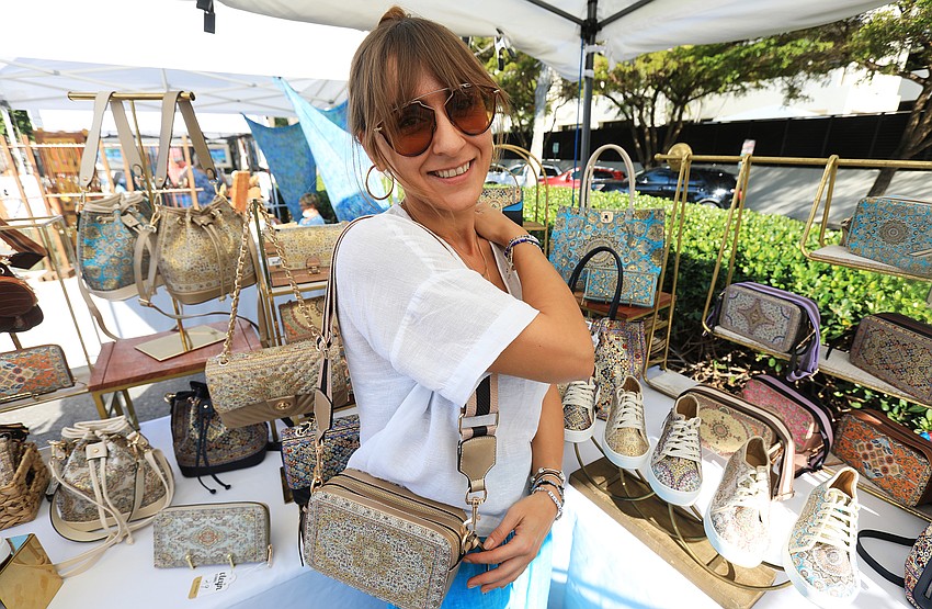 Elisa Angjieli showcased her handbags and accessories with woven carpet designs.