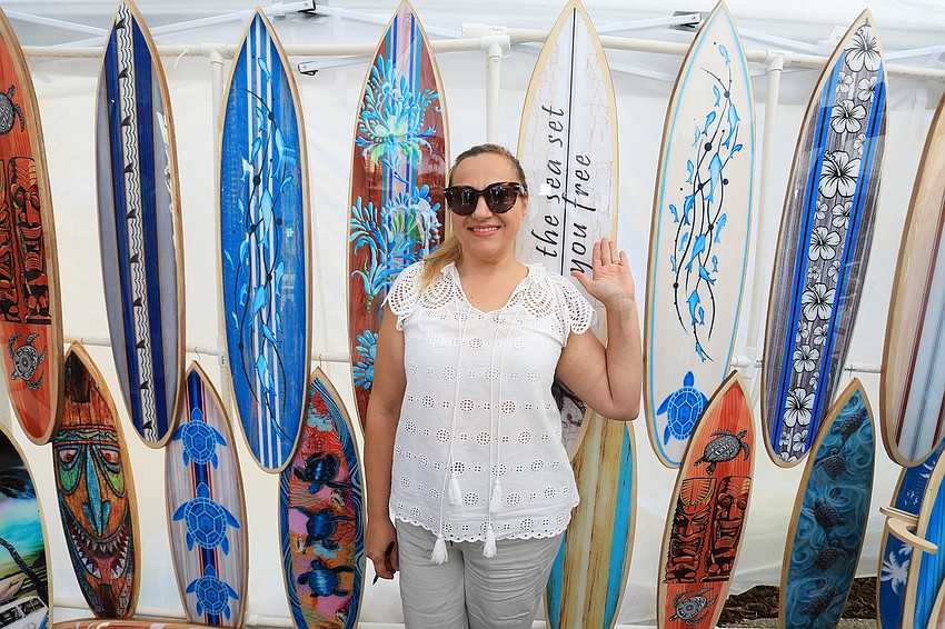 Sarasota resident Olga Hill makes graphic design surfboards with wood and resin patterns.