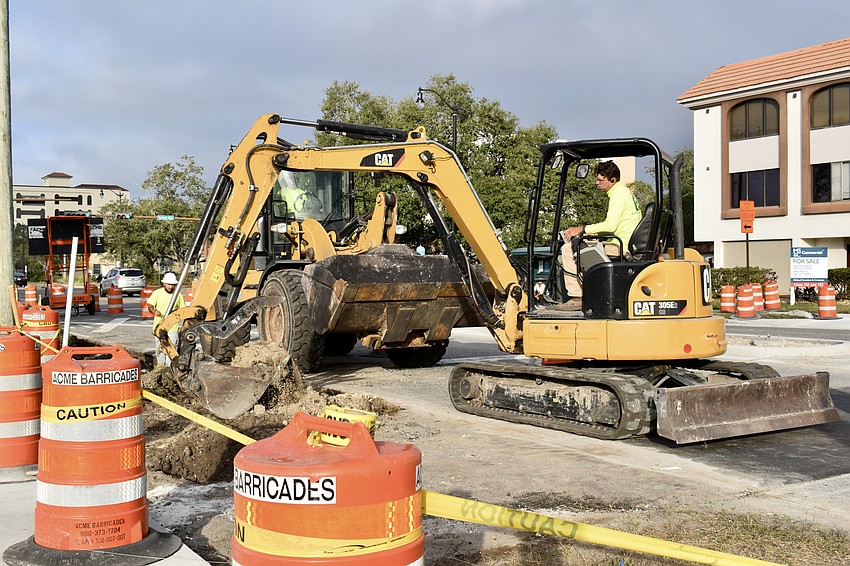 Workers in December smoothed over a former rail crossing on Ringling Boulevard and installed a center median and pedestrian signs and alert signals.
