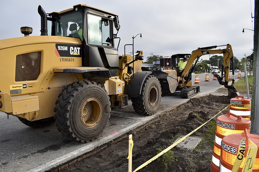 Workers in December smoothed over a former rail crossing on Ringling Boulevard and installed a center median and pedestrian signs and alert signals.