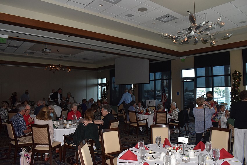 Attendees had lunch, then listened to Dale Anderson's presentation.