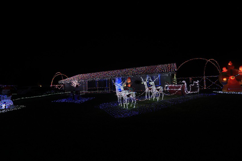 5142 Bunyan Street — This  house brings a slide full of penguins and reindeer.