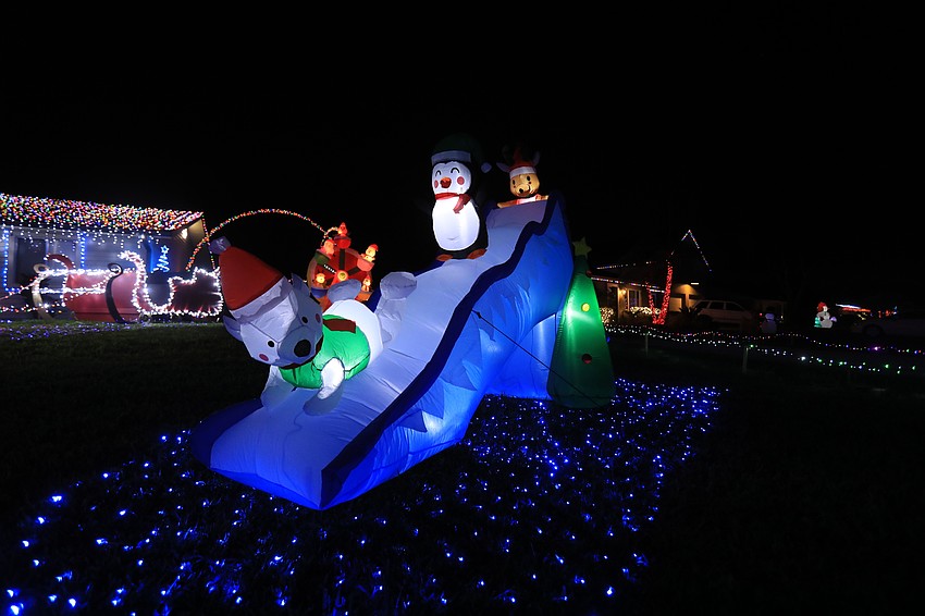 5142 Bunyan Street — This  house brings a slide full of penguins and reindeer.