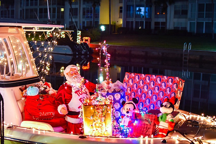 This year, Longboat Harbour residents raised $5,280 for Toys for Tots, according to condo commodore Bill Coughlin. It breaks the condo's previous record contribution of $2,635. Submitted