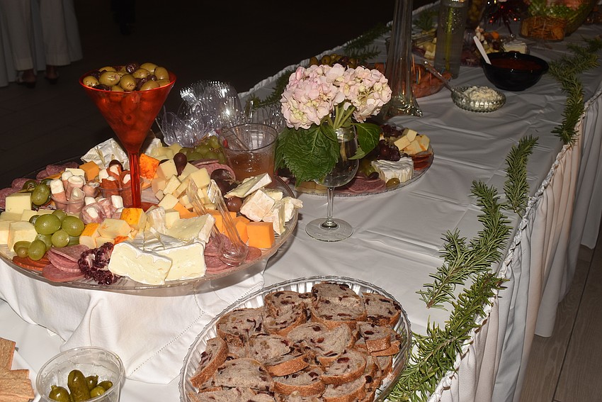 The table was set with plenty of food and decorated with rosemary.