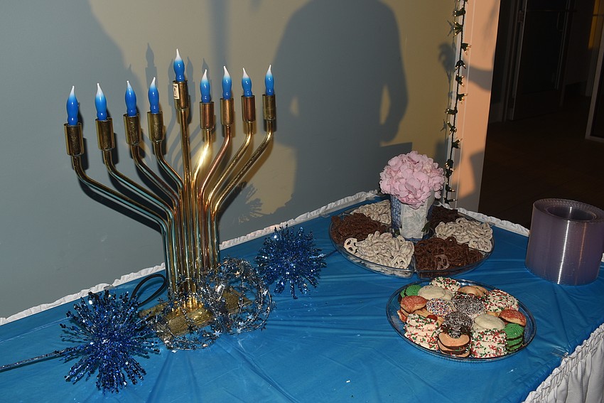 The dessert table was decorated with a menorah.