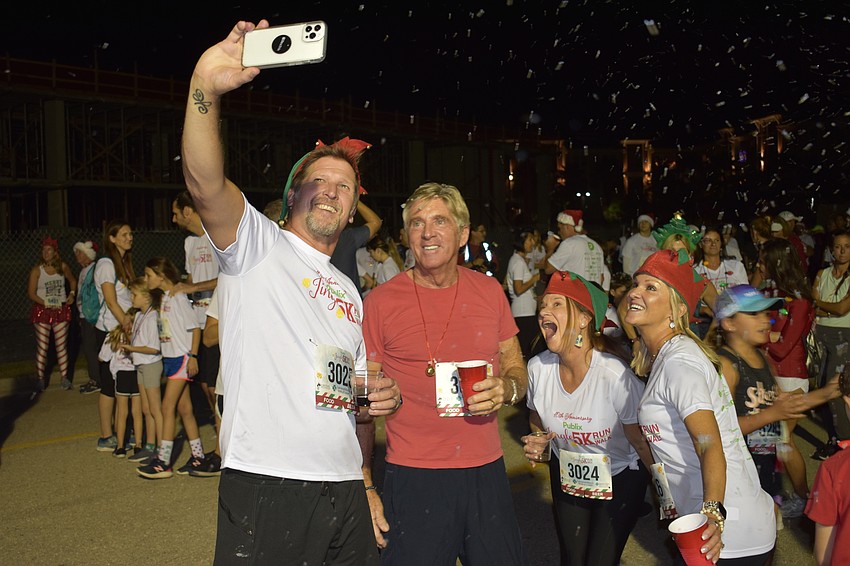 Tom Fitzpatrick of Lakewood Ranch grabs a selfie with Art Paterson, Elizabeth Fitzpatrick and Stacy Rumbaugh, all of Lakewood Ranch.