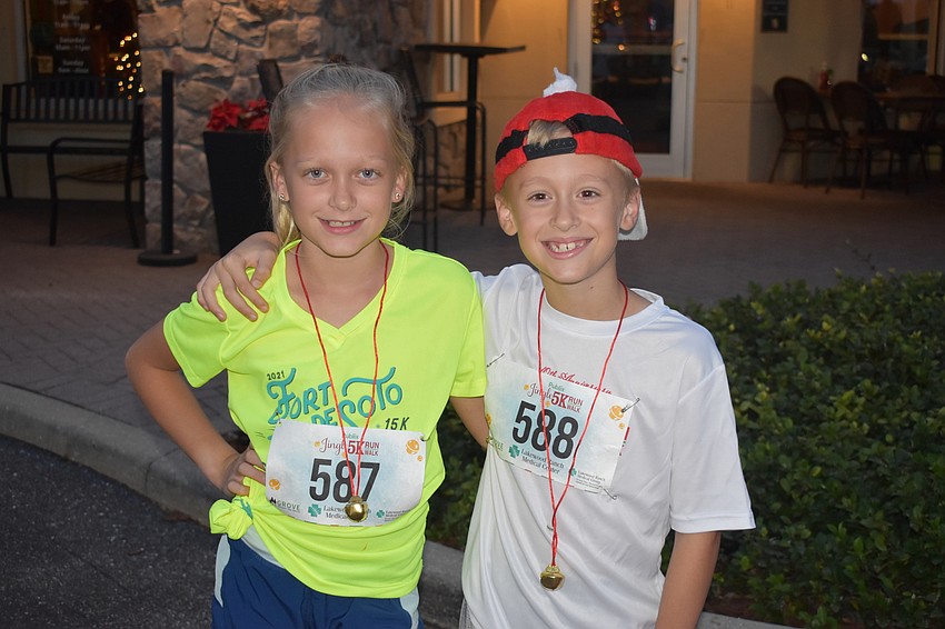 Ava and Henry Masuga just had to come downstairs from their home at Focus on Lakewood Ranch Main Street to take part in the Santa Dash.