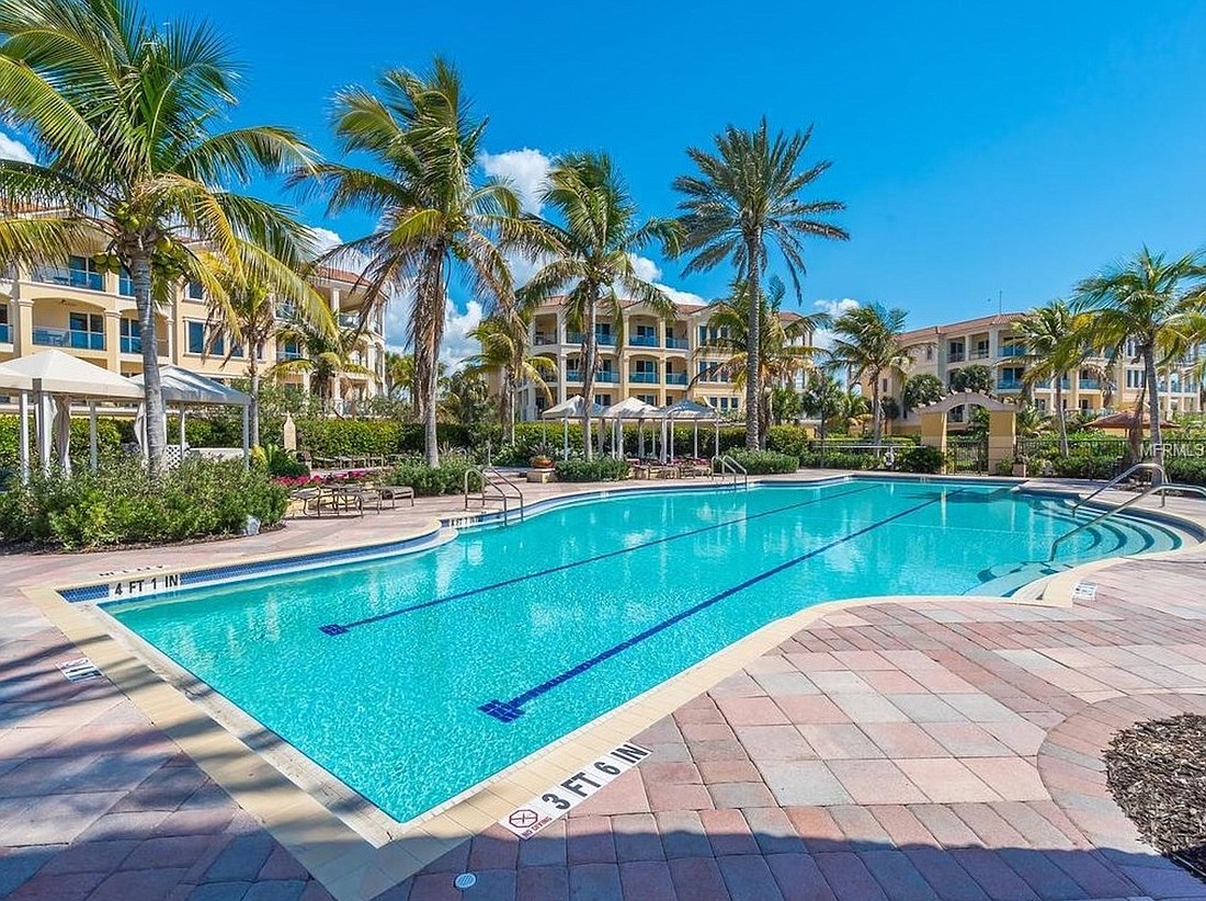 Unit 101 condominium at 4955 Gulf of Mexico Drive  was built in 2007. It has three bedrooms, three-and-a-half baths, a pool and 3,122 square feet of living area.