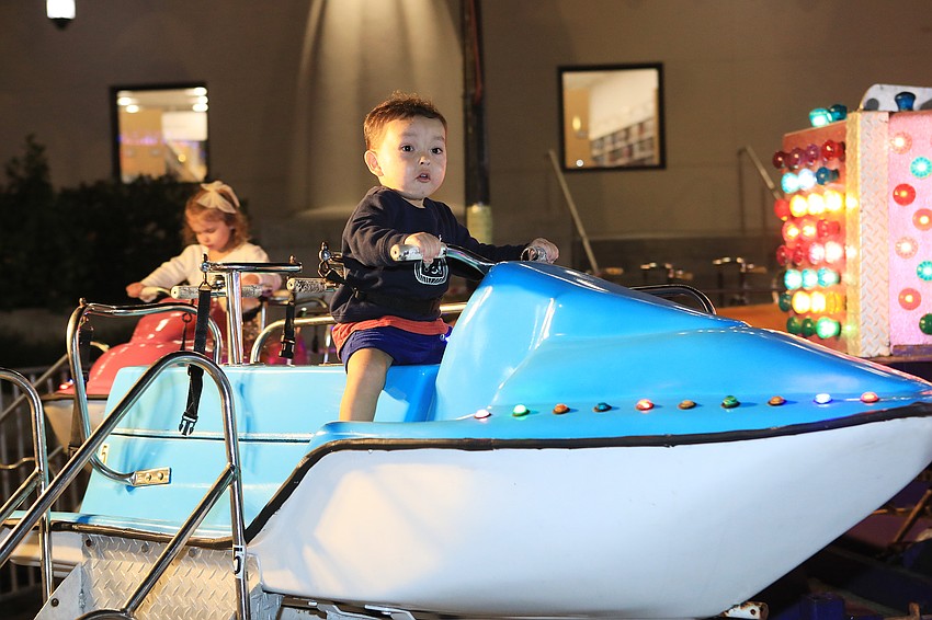Bodhi Ngo keeps focused on the carnival ride.