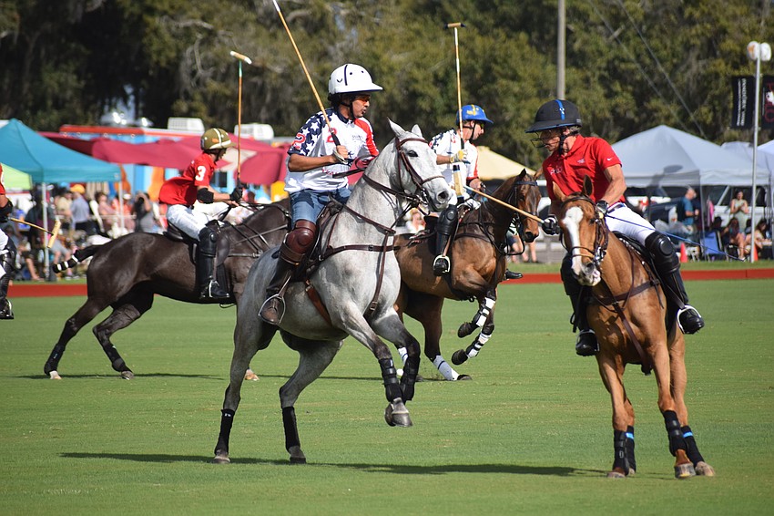 Florado/Sharp Printing's Joaquin Navarro Montoya and Hillcroft/Hawkwood's Barclay Knapp make a quick turn after overrunning the ball.