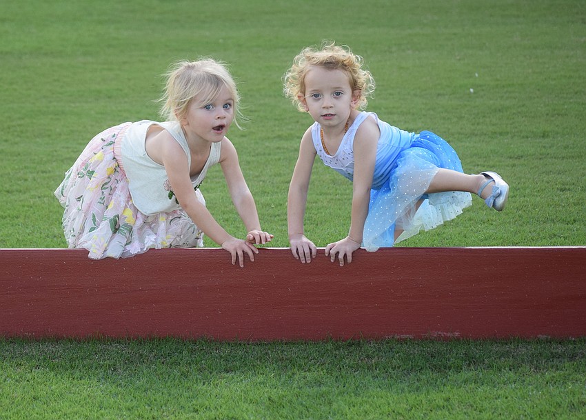 East County 2-year-old Emma Sands and Sarasota 2-year-old Sofia Maniscalco are best friends who have fun along the polo sideline.