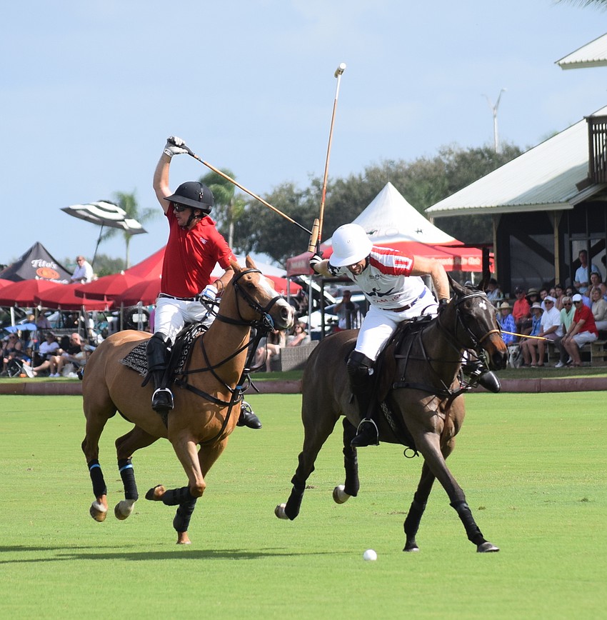 Slade Sharpsteen of Florado/Sharp Printing (right) beats Hillcroft/Hawkwood's Leandro Berrios to the ball.