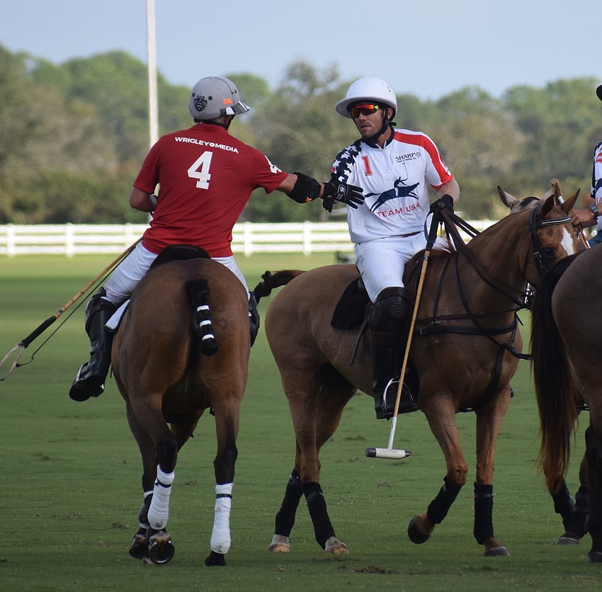 James Miller and Slade Sharpsteen shake hands after the match.