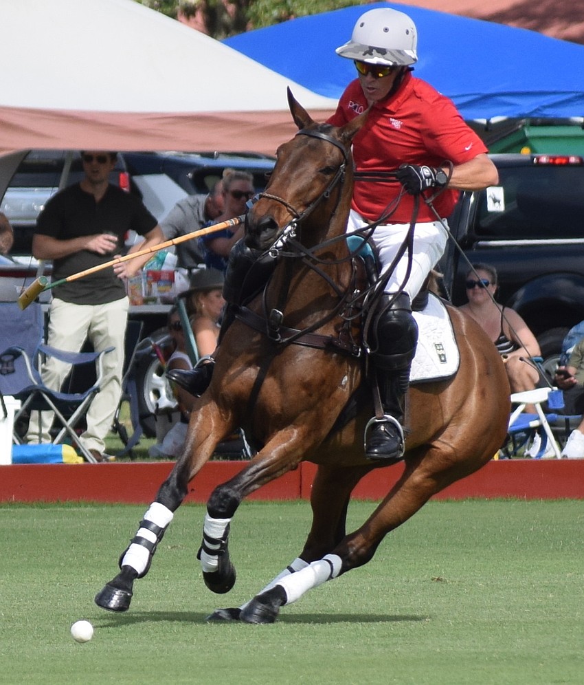 James Miller drives the ball up the field for Hillcroft/Hawkwood.