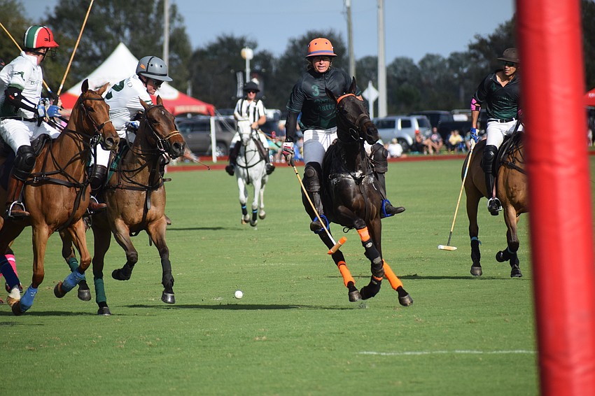 Trevor Niznik comes down the middle for Organic Matters/North South Wealth Management in the consolation match.