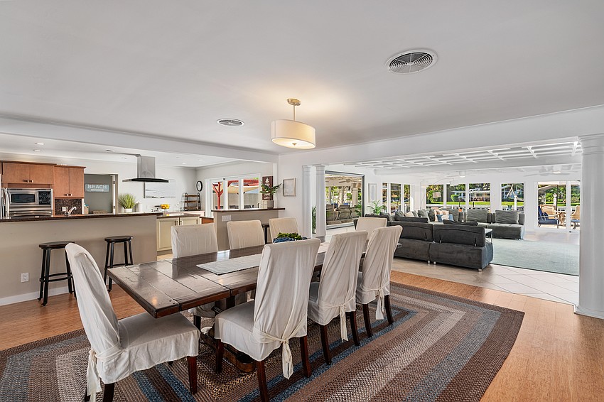 Vaulted and coffered ceilings are featured throughout the main level.