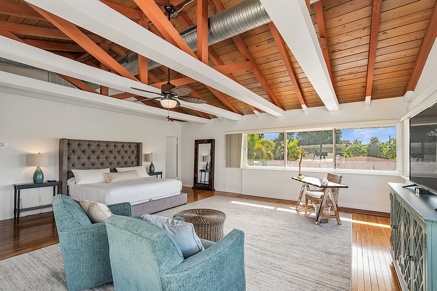The open floor plan overlooks the pool.