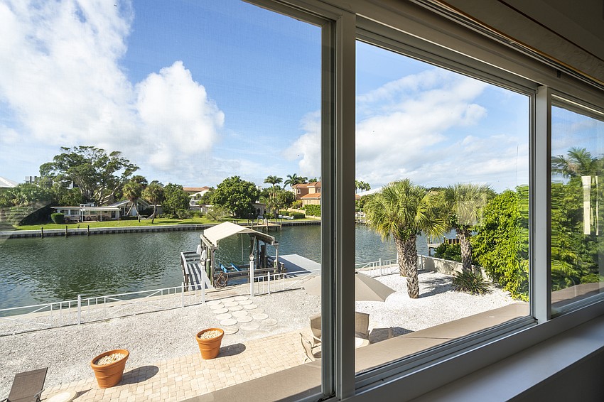 The open floor plan overlooks the pool.