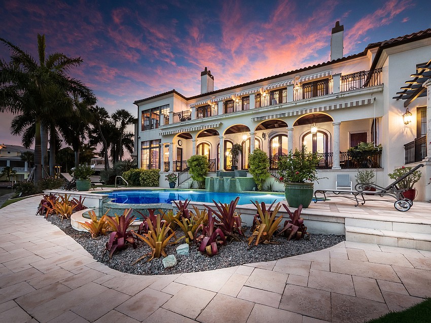 The views from the first and second floor overlook the pool area.