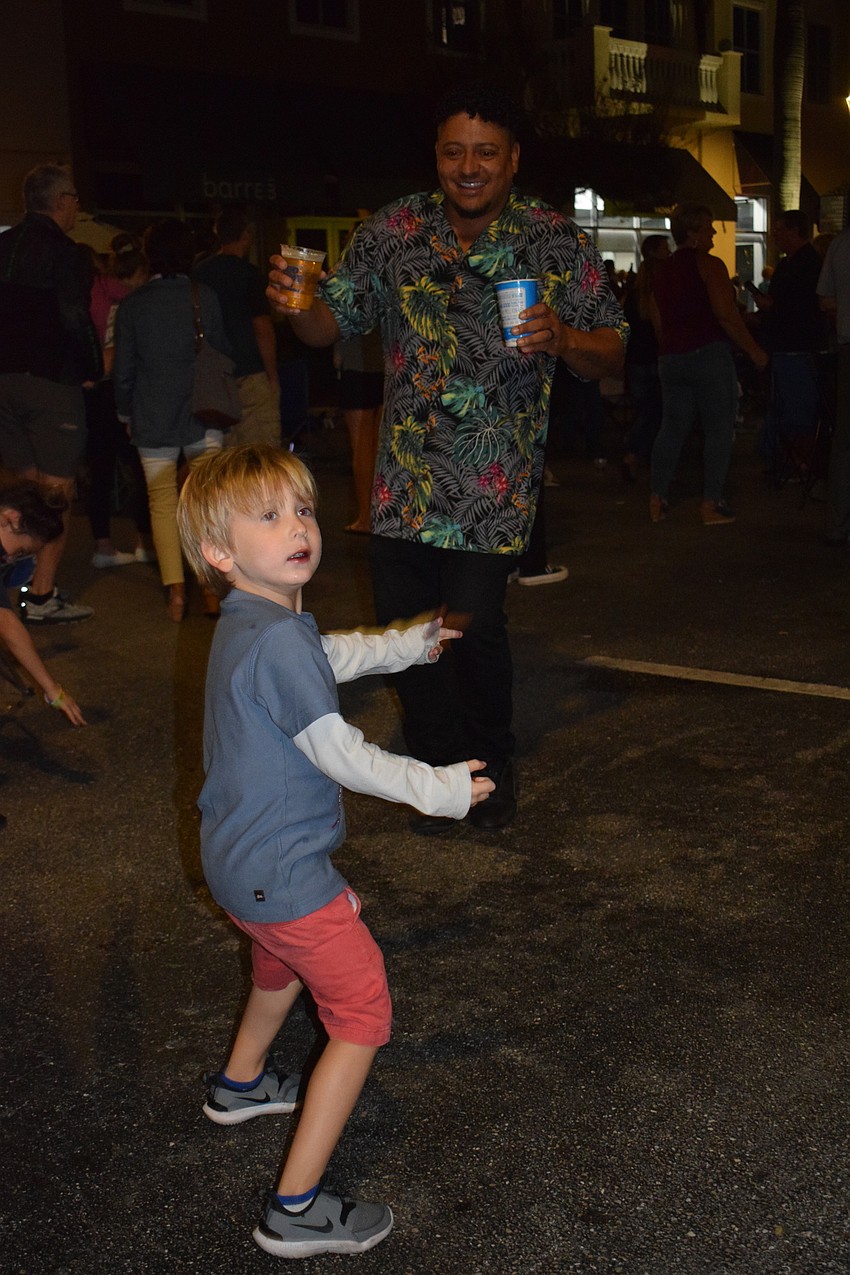 Lakewood Ranch's Benjamin Angel dances with Lakewood Ranch's Junior Fonseca.