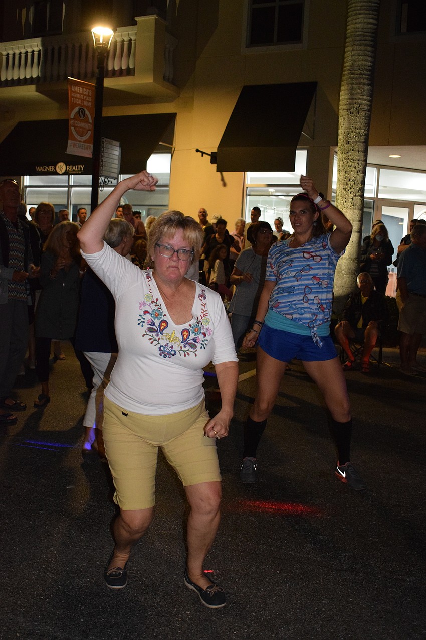 Bradenton's Randi Primrose and Heather Holbrook have a blast dancing together.