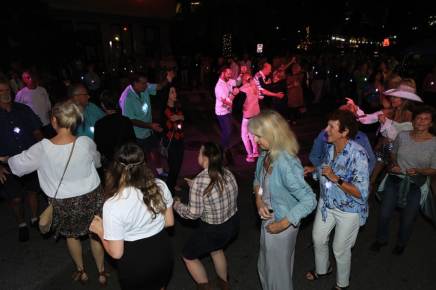 The audience dances the night away.