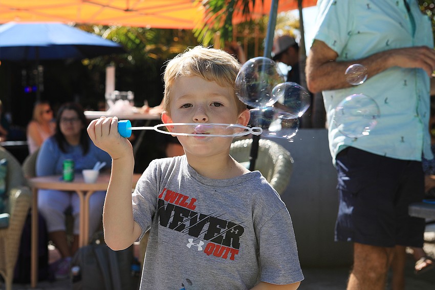 Beckham Buchanan works on his own bubbles.