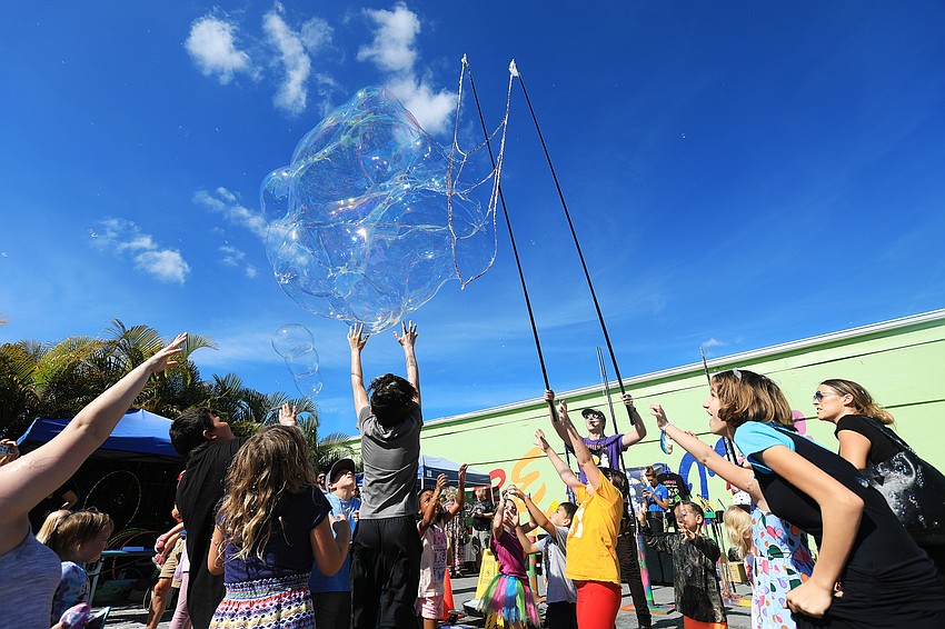 Blaise Ryndes dazzles the crowd with bubbles.