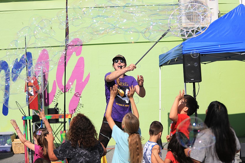 Blaise Ryndes dazzles the crowd with bubbles.