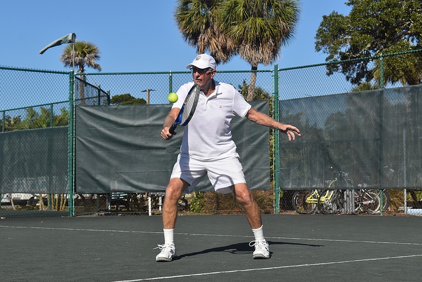 Greg Lavallee hits a backhand during the Division 3 round robin.