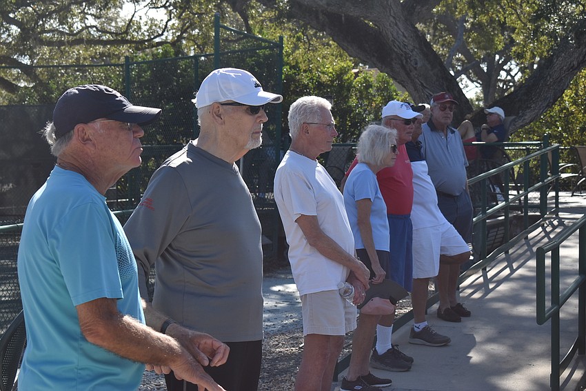 Dozens of bystanders came to play vicariously through the athletes on the court. More than 40 people watched from the sidelines and the second floor of the tennis center.