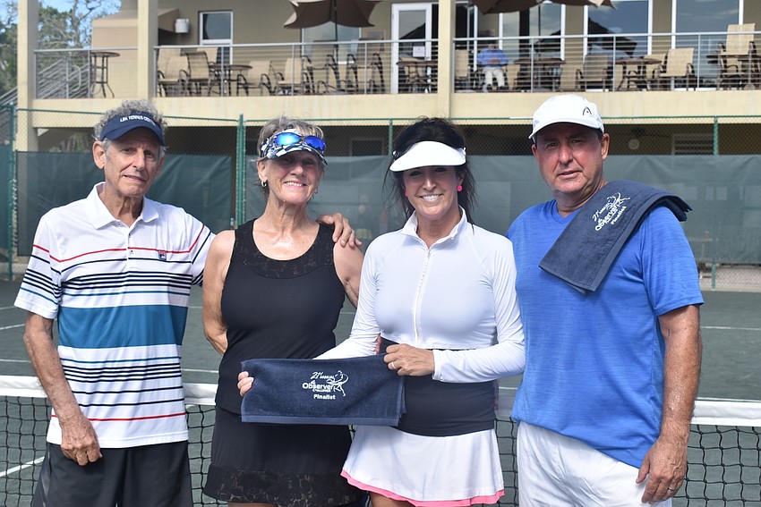 Division 1 finalists Enrique Vela, Ute Vela, Mitzi Lamy and Kevin Lamy