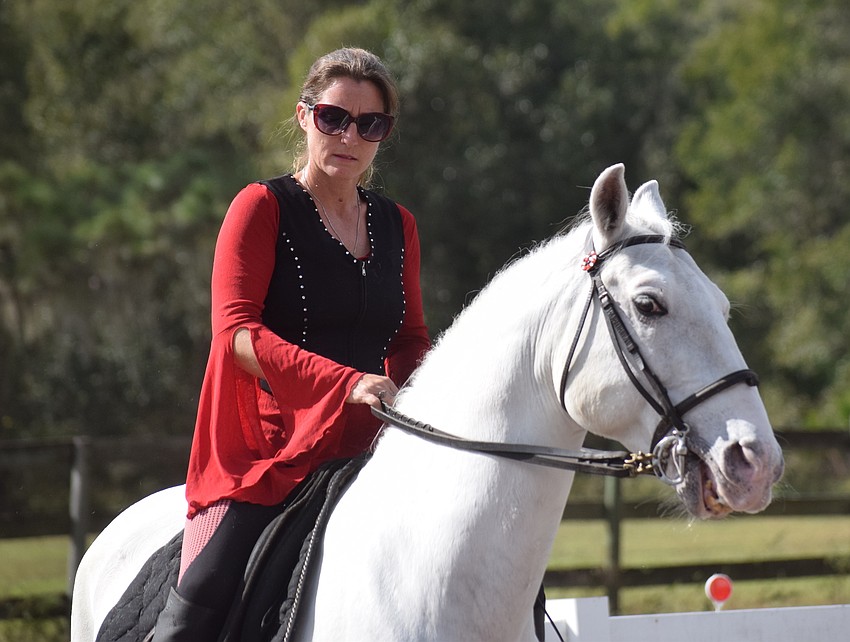 Rebecca McCullough says it has been overwhelming to keep Herrmann's Royal Lipizzan stallions going after the death of family matriarch Gabby Herrmann last March.