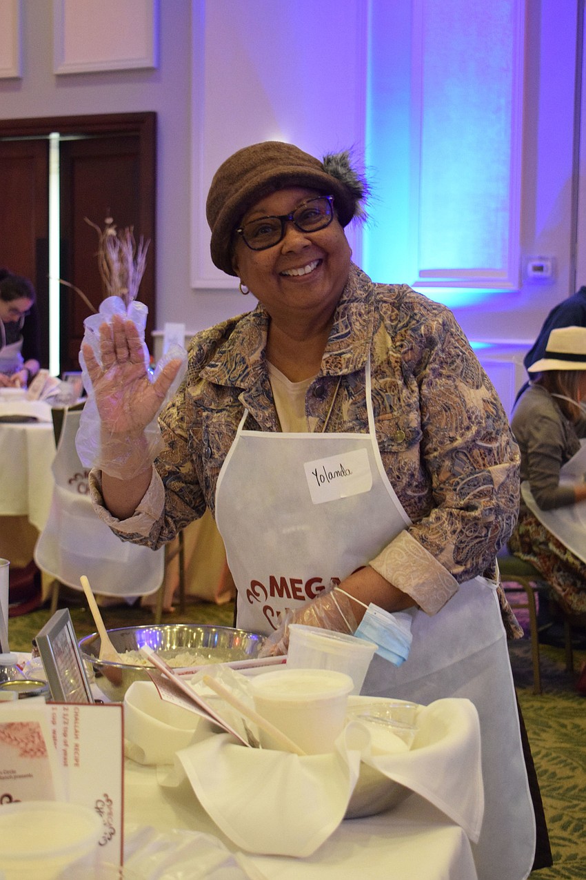 Sun City's Yolanda Rivera enjoys making challah during the Mega Challah Bake in Lakewood Ranch.