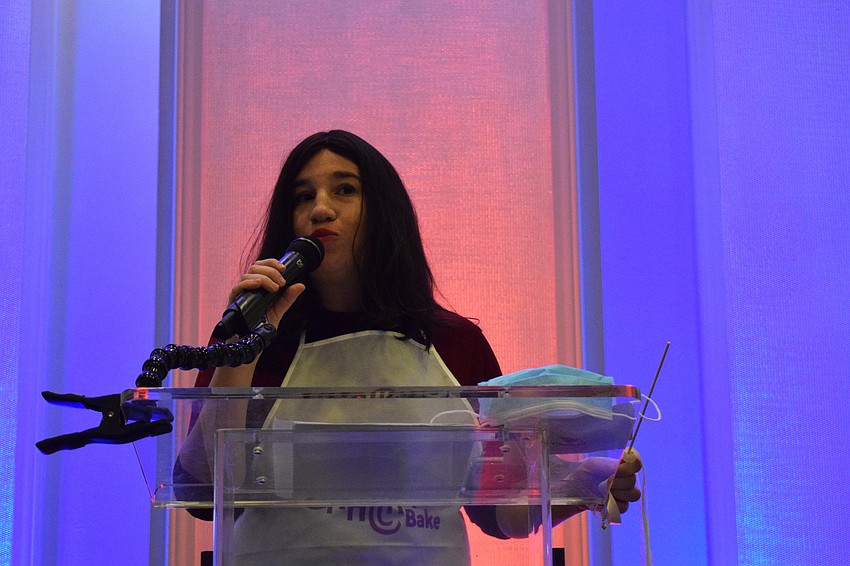 Chanie Bukiet, the director of the Jewish Women’s Circle, greets Mega Challah Bake participants at the Grove.