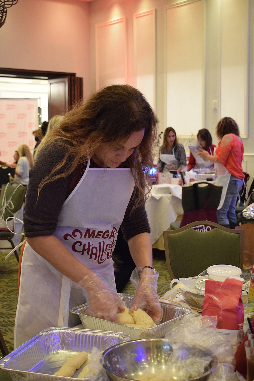 Sarasota's Leslie Patterson adds ingredients to her dough.