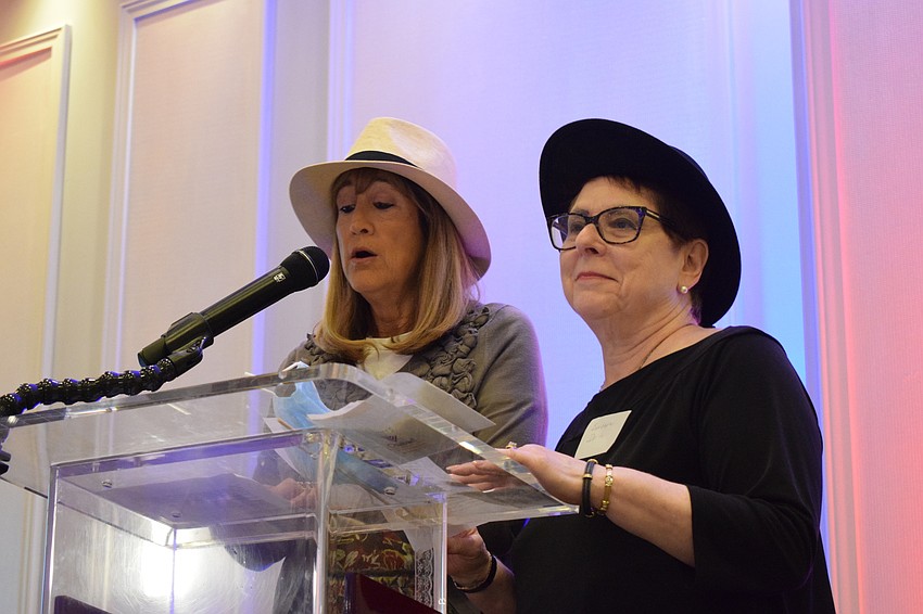 Lakewood Ranch's Laura Weinshel and Barbara Dolin lead the group in prayer.