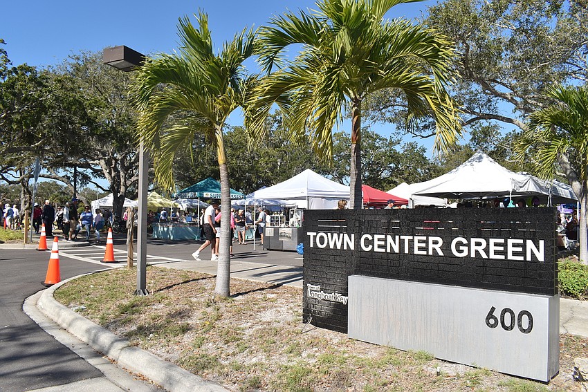 Hundreds of people filed through Town Center Green during the market.