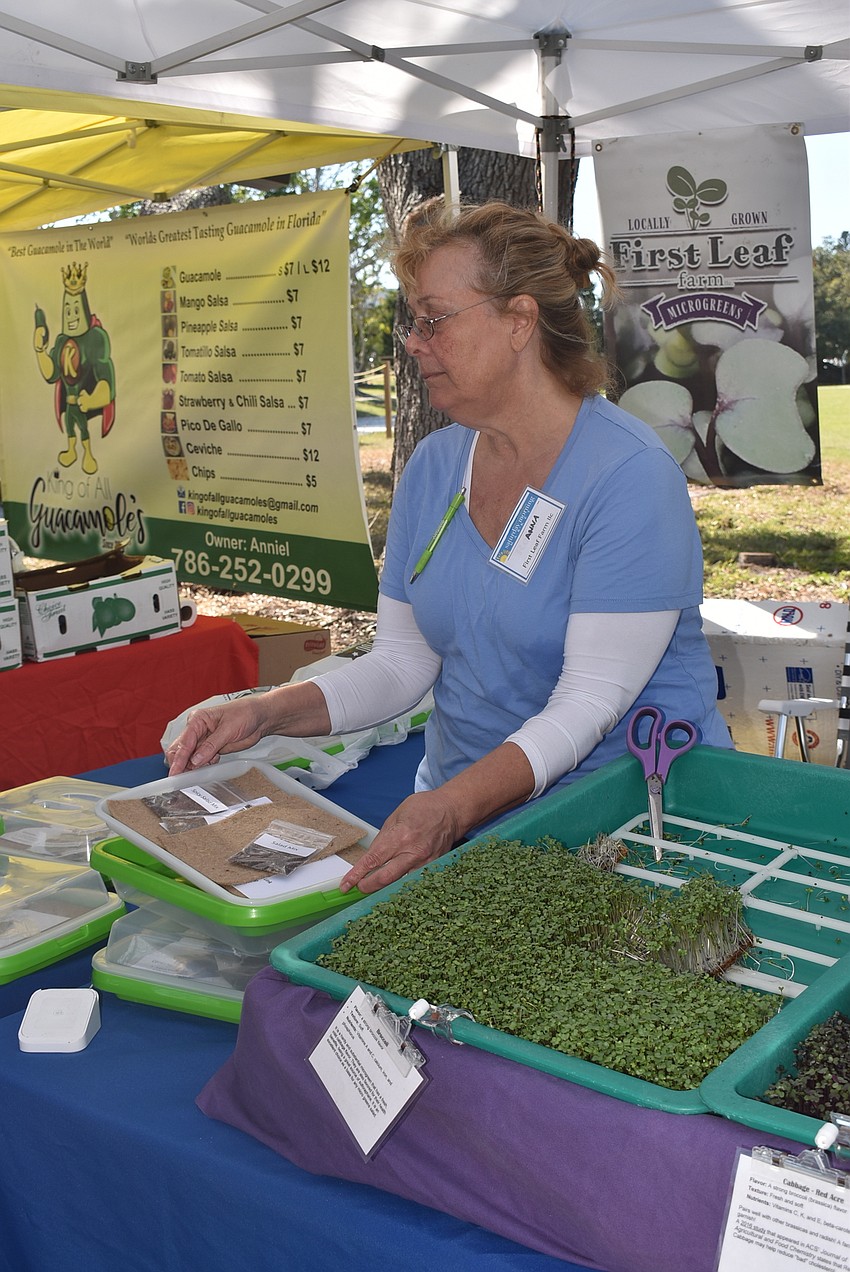 Anna McClement explained microgreens to customers.